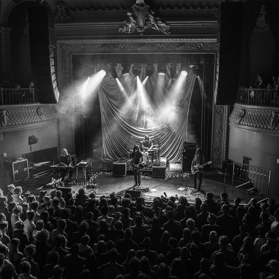 microphone on stage in light and fog